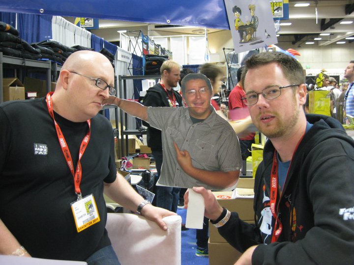 Just wanted to share this old picture of Agent Bobby as a cardboard cut being held by Penny Arcades creators.