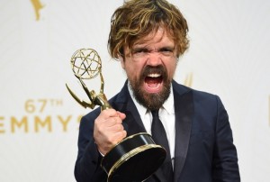 Peter Dinklage arrives in the Press Room with his award for Best Supporting Actor in a Drama at the 67th Emmy Awards on September 20, 2015 at the Microsoft Theater in Los Angeles, California. AFP PHOTO / VALERIE MACON